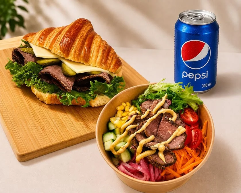 Catering platter of fresh croissants, bagels and signature bowls from Maison Croissant & Bowls in Winnipeg